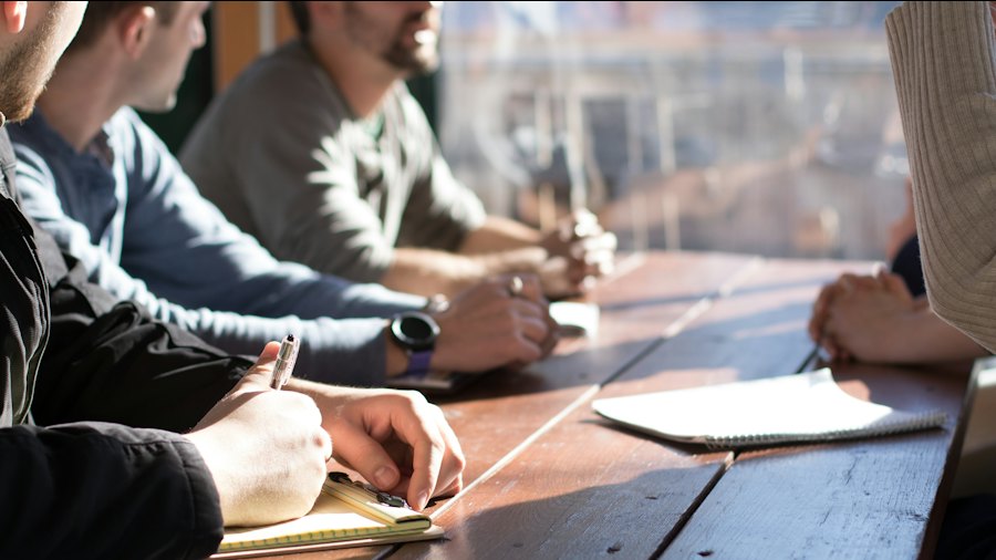 Client planning session around a conference table